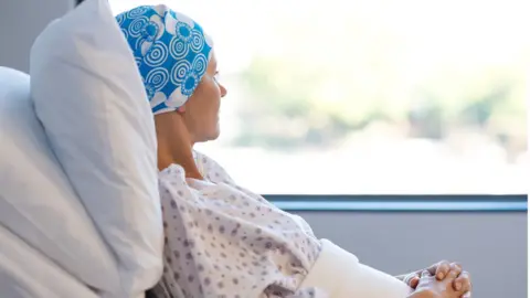 Getty/Ridofranz cancer patient in bed