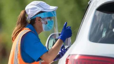 PA Media Tester speaking to someone in a car