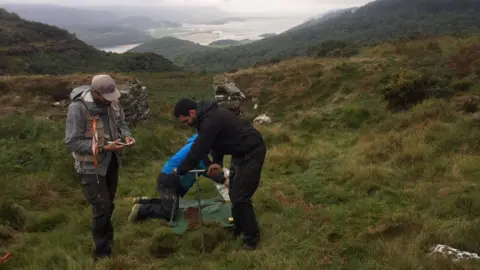 Alba Mineral Resources Soil samples being taken on Welsh hillside