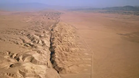 Science Photo Library Aerial view of San Andreas Fault - a long rift in the desert