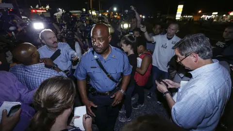 Getty Images Captain Ron Johnson of the Missouri Highway Patrol speaks to media during a protest on August 18, 2014 for Michael Brown, who was killed by a police officer on August 9 in Ferguson, United States.