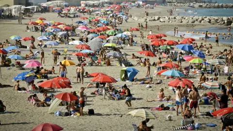 PA Holidaymakers on a beach