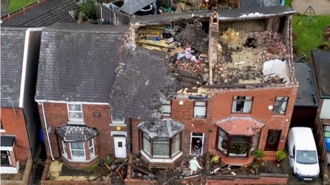 Reuters/Phil Noble House roof blown off in Stalybridge