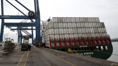 PA Container ship under crane on dockside