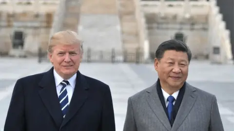 AFP US President Donald Trump, and Chinese President Xi Jinping pose at the Forbidden City in Beijing