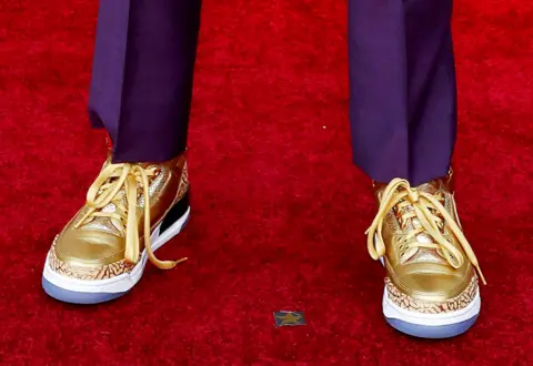 Reuters Gold shoes on the red carpet