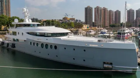 Getty Images The luxury yacht "Event", reportedly owned by Evergrande boss, docked in Hong Kong in 2021.