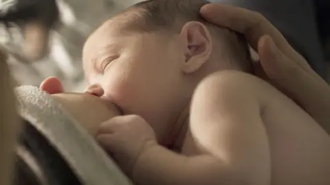 PA Media Baby breastfeeding