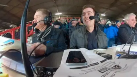 The commentary team in action at The Racecourse