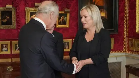 Reuters King Charles and Michelle O'Neill