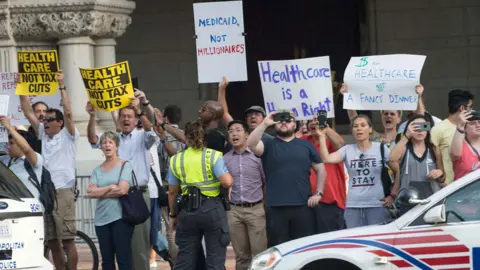 AFP Protests outside Trump hotel