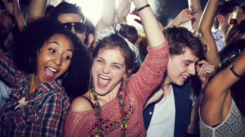 Getty Images Dancing at a gig