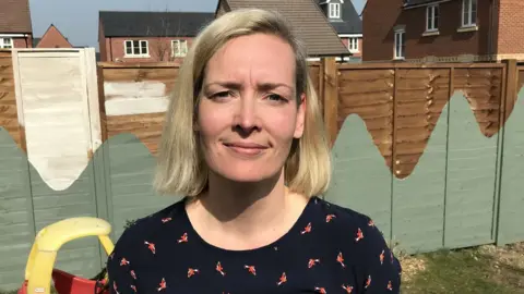 Sam Read/BBC Hana Foltynova a Biggleswade based childminder in her back garden