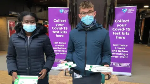 Glasgow central station, handing out covid tests