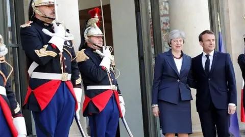 Reuters Theresa May and Emmanuel Macron at the Elysee Palace in Paris