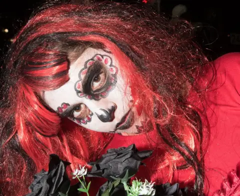 DCSDC Woman wearing Mexican-style Halloween make up