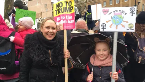 Lisa Hughes and her eight-year-old daughter