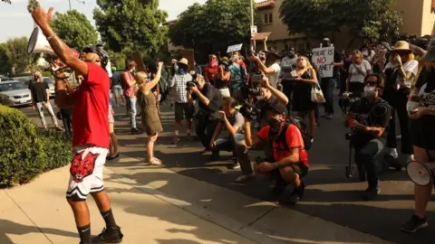 Getty Images Chris Smalls has led protests against Amazon around the country - including in front of Jeff Bezos properties