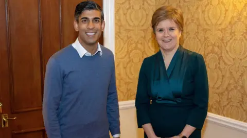 Reuters UK Prime Minister Rishi Sunak and Scottish FM Nicola Sturgeon