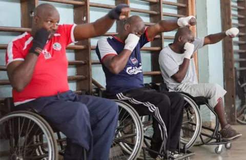 EPA Kenyan para-boxers throw punches at each other during a training session at a social hall in Nairobi, Kenya, 16 November 2018.