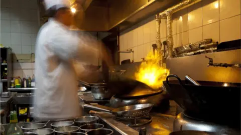 Getty Images Kitchen worker