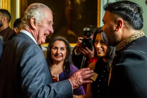 Pool King Charles hosts a reception to celebrate British South Asian communities at the Palace of Holyroodhouse in Edinburgh