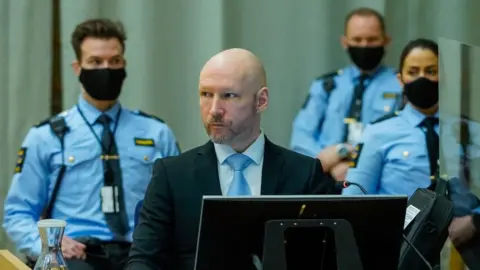 Anders Behring Breivik, convicted of terrorism, attends the second day of his trial where he is requesting release on parole, on January 19, 2022 at a makeshift courtroom in Skien prison, Norway