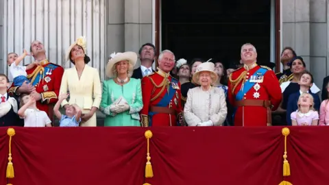 Reuters The Queen and other family members gathered to witness the Red Arrows perform a flypast