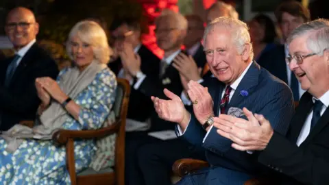 Getty Images Charles and Camilla at an evening of music and drama, celebrating Welsh culture, and a diplomatic reception on July 05, 2022 at Llwynywermod, Myddfai, Llandovery, Carmarthenshire