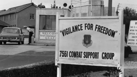 Express/ Getty Images 16th September 1972: The entrance to the American Airforce Base at Greenham Common, Berkshire, where visitors are greeted by the sign 'Vigilance For Freedom