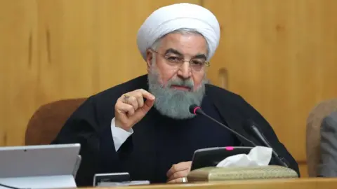 EPA Iranian President Hassan Rouhani speaks during a cabinet meeting in Tehran (31 December 2017)