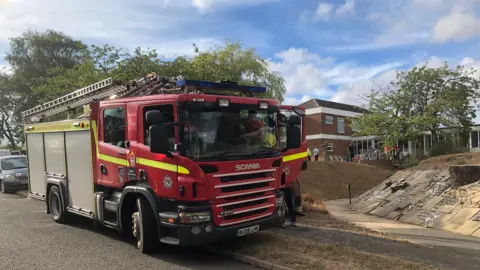 Steve Silk/BBC Fire engine outside Beauchamp House