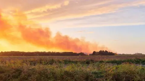 Donna Thomas Kirton hay bales blaze