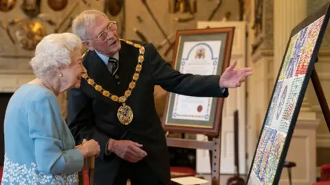 Getty Images Queen Elizabeth II and Harry Humphrey