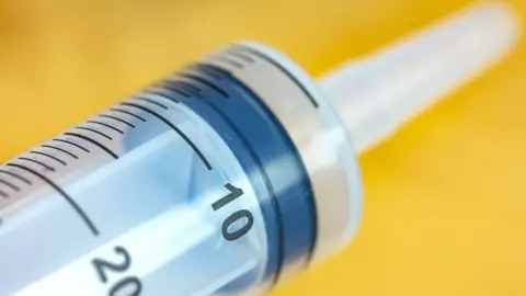 Getty Images Plastic syringe