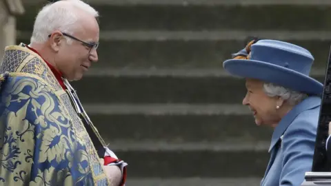 Getty Images Queen Elizabeth II is greeted by The Very Reverend Dr David Hoyle, Dean of Westminster