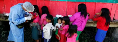 Reuters Peru children get vaccinated