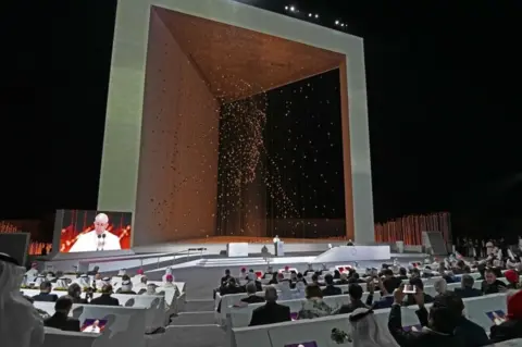 AFP Pope Francis addresses a conference of religious leaders in Abu Dhabi (4 February 2019)