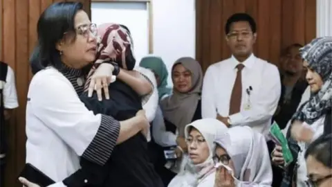 Mini Finance Minister Sri Mulyani consoles staff