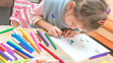 Getty Images Child drawing