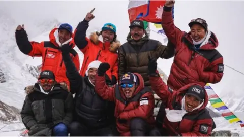 The team of Nepalese climbers who made history by climbing to the K2 summit in winter for the first time.