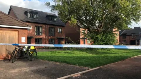 BBC Police 'do not cross' cordon near houses