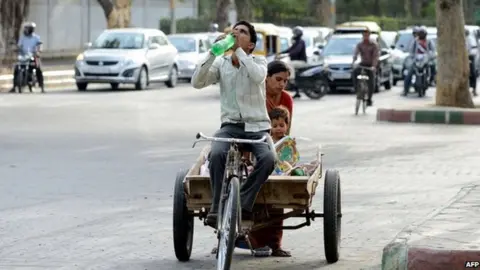 AFP Some Indian cities have recorded temperatures approaching nearly 50C (122F)