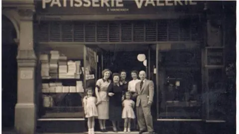 Vermeirsch family The Vermeirsch family at Patisserie Valerie, Old Compton Street in July 1950. (Left to right) Julia, Marie Louise, Auntie Esther, Auntie Selma, Leni, Mama, Pa.