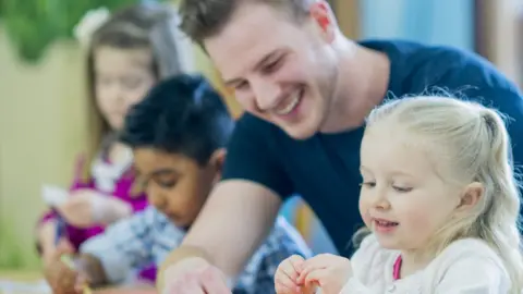Getty Images male childcare worker