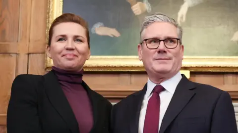 EPA British Prime Minister Keir Starmer and Danish Prime Minister Mette Frederiksen (L) shake hands as they hold a bilateral meeting at Chequers, the official country residence of the UK Prime Minister, in Buckinghamshire, Britain, 22 January 2026.