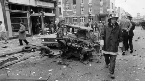 Hulton Deutsch/Getty Images The wreck of a car following the bomb in Talbot Street, Dublin, in 1974