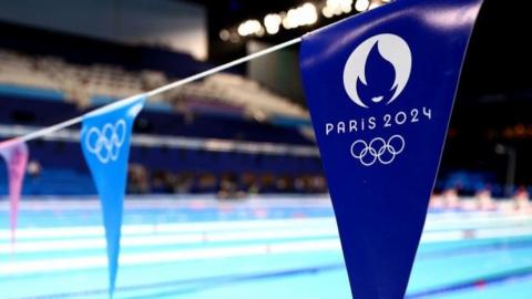 Paris 2024 banner in swimming pool