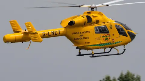 A Lincs and Notts Air Ambulance in flight