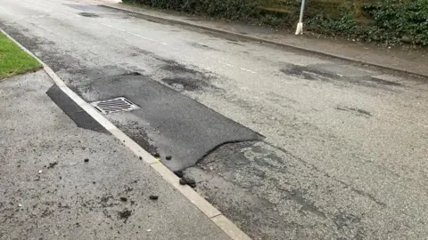 Peter Hortor A view of a repair put down near Kinoulton in February 2026, with some crumbling of tarmac at the edge of the road.
